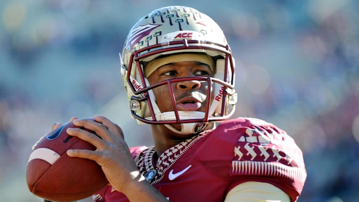 Nov 29, 2014; Tallahassee, FL, USA; Florida State Seminoles quarterback Jameis Winston (5) warms up before the start of the game against the Florida Gators at Doak Campbell Stadium. Mandatory Credit: Melina Vastola-Imagn Images