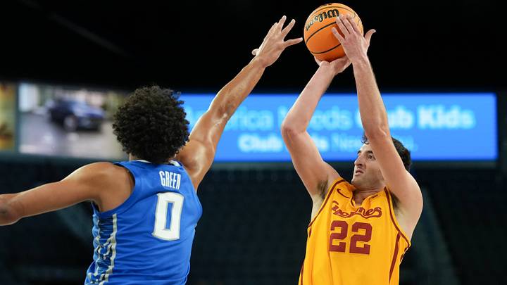 Nov 25, 2025; Las Vegas, Nevada, USA; Iowa State Cyclones forward Milan Momcilovic (22) shoots the ball defended by Creighton Bluejays forward Jasen Green (0) during the first half in a 2025 Players Era Festival group play game at Michelob Ultra Arena. Mandatory Credit: Kirby Lee-Imagn Images Nov 25, 2025; Las Vegas, Nevada, USA; Iowa State Cyclones forward Milan Momcilovic (22) shoots the ball defended by Creighton Bluejays forward Jasen Green (0) during the first half in a 2025 Players Era Festival group play game at Michelob Ultra Arena. Mandatory Credit: Kirby Lee-Imagn Images