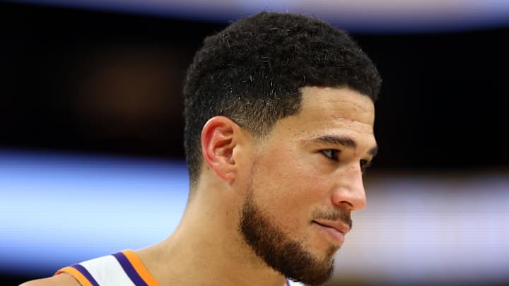 Nov 24, 2025; Phoenix, Arizona, USA; Phoenix Suns guard Devin Booker (1) against the Houston Rockets at Mortgage Matchup Center. Mandatory Credit: Mark J. Rebilas-Imagn Images Nov 24, 2025; Phoenix, Arizona, USA; Phoenix Suns guard Devin Booker (1) against the Houston Rockets at Mortgage Matchup Center. Mandatory Credit: Mark J. Rebilas-Imagn Images