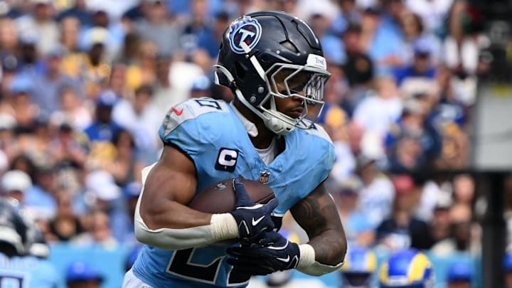 Sep 14, 2025; Nashville, Tennessee, USA; Tennessee Titans running back Tony Pollard (20) rushes the ball against the Los Angeles Rams during the second half at Nissan Stadium. Mandatory Credit: Steve Roberts-Imagn Images Sep 14, 2025; Nashville, Tennessee, USA; Tennessee Titans running back Tony Pollard (20) rushes the ball against the Los Angeles Rams during the second half at Nissan Stadium. Mandatory Credit: Steve Roberts-Imagn Images