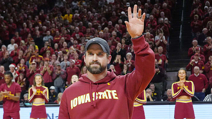 Iowa State football coach Jimmy Rogers speaks during a timeout in the first half in the Iowa State and Iowa men’s basketball Cy-Hawk series at Hilton coliseum on Dec. 11, 2025, in Ames, Iowa.