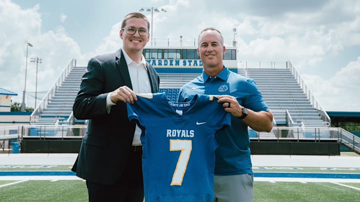The First Academy's Assistant Head of School for Campus Operations, left, poses with head football coach Jeff Conaway during 2023 Media Days. TFA on Monday lost an appeal to get its 2025 postseason ban lifted after going 5-5 in the regular season.
