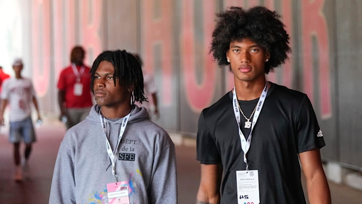 Aug 31, 2024; Columbus, OH, USA; Ohio State Buckeyes recruits Kayden Dixon-Wyatt and Chris Henry Jr. walk onto the field prior to the NCAA football game against the Akron Zips at Ohio Stadium. Ohio State won 52-6.
