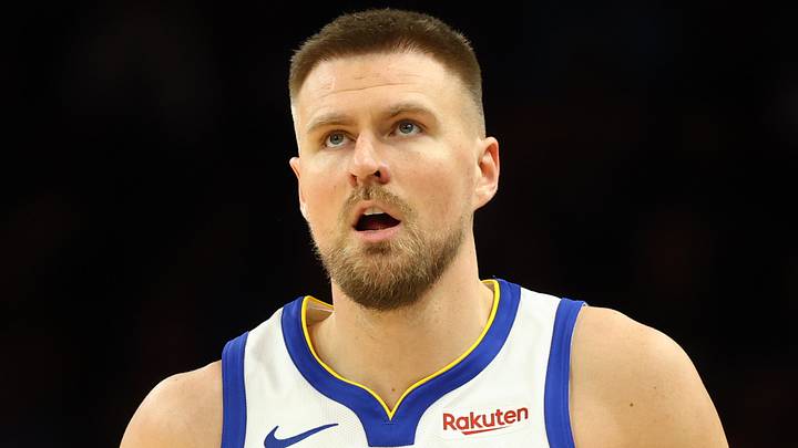 Apr 17, 2026; Phoenix, Arizona, USA; Golden State Warriors center Kristaps Porzingis (7) against the Phoenix Suns during the play-in rounds of the 2026 NBA Playoffs at Mortgage Matchup Center. Mandatory Credit: Mark J. Rebilas-Imagn Images