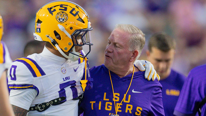 Oct 11, 2025; Baton Rouge, Louisiana, USA; LSU Tigers head coach Brian Kelly talks to wide receiver Zavion Thomas (0) against the South Carolina Gamecocks during the first half at Tiger Stadium. Mandatory Credit: Stephen Lew-Imagn Images Oct 11, 2025; Baton Rouge, Louisiana, USA; LSU Tigers head coach Brian Kelly talks to wide receiver Zavion Thomas (0) against the South Carolina Gamecocks during the first half at Tiger Stadium. Mandatory Credit: Stephen Lew-Imagn Images