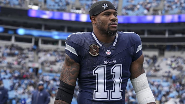  Dallas Cowboys linebacker Micah Parsons (11) walks onto the field during the first quarter against the Carolina Panthers at Bank of America Stadium.