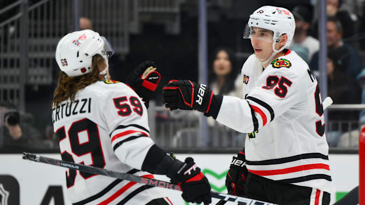Apr 4, 2026; Seattle, Washington, USA; Chicago Blackhawks right wing Ilya Mikheyev (95) celebrates with left wing Tyler Bertuzzi (59) after scoring an empty net goal against the Seattle Kraken during the third period at Climate Pledge Arena. Mandatory Credit: Steven Bisig-Imagn Images Apr 4, 2026; Seattle, Washington, USA; Chicago Blackhawks right wing Ilya Mikheyev (95) celebrates with left wing Tyler Bertuzzi (59) after scoring an empty net goal against the Seattle Kraken during the third period at Climate Pledge Arena. Mandatory Credit: Steven Bisig-Imagn Images