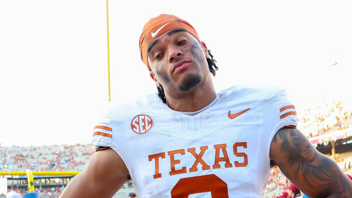 Oct 12, 2024; Dallas, Texas, USA; Texas Longhorns wide receiver DeAndre Moore Jr. (0) reacts after the game against the Oklahoma Sooners at the Cotton Bowl. 
