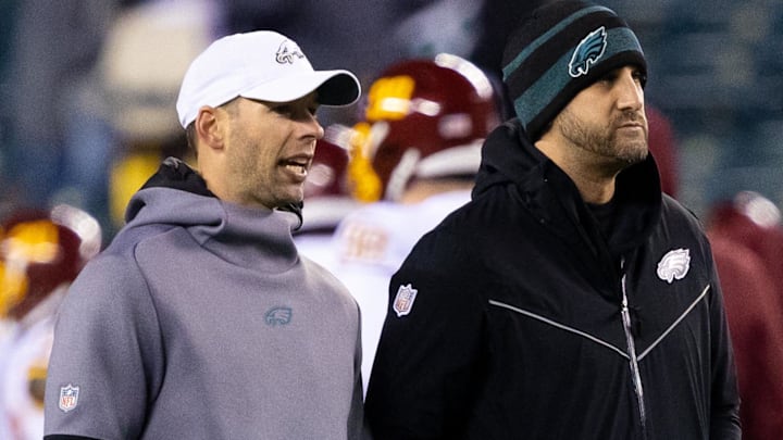 Dec 21, 2021; Philadelphia, Pennsylvania, USA; Philadelphia Eagles head coach Nick Sirianni (R) and defensive coordinator Jonathan Gannon (L) before action against the Washington Football Team at Lincoln Financial Field. Mandatory Credit: Bill Streicher-Imagn Images