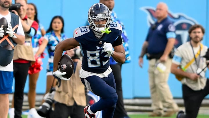 Nov 17, 2024; Nashville, Tennessee, USA; Tennessee Titans wide receiver Tyler Boyd (83) runs with the ball after a made catch against the Minnesota Vikings during the second half at Nissan Stadium. Mandatory Credit: Steve Roberts-Imagn Images Nov 17, 2024; Nashville, Tennessee, USA; Tennessee Titans wide receiver Tyler Boyd (83) runs with the ball after a made catch against the Minnesota Vikings during the second half at Nissan Stadium. Mandatory Credit: Steve Roberts-Imagn Images
