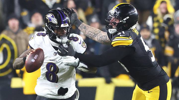 Jan 4, 2026; Pittsburgh, Pennsylvania, USA; Baltimore Ravens quarterback Lamar Jackson (8) scrambles with the ball as Pittsburgh Steelers linebacker Nick Herbig (51) cases during the fourth quarter at Acrisure Stadium. Mandatory Credit: Charles LeClaire-Imagn Images Jan 4, 2026; Pittsburgh, Pennsylvania, USA; Baltimore Ravens quarterback Lamar Jackson (8) scrambles with the ball as Pittsburgh Steelers linebacker Nick Herbig (51) cases during the fourth quarter at Acrisure Stadium. Mandatory Credit: Charles LeClaire-Imagn Images