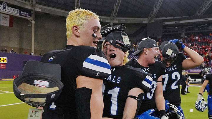 MMCRU's running back/linebacker Brayson Mulder (1) and slotback/linebacker Parker Glassmaker (21) celebrate after winning 30-17 over Saint Ansgar in the class-A state football championship on Nov. 20, 2025, at UNI Dome in Cedar Falls, Iowa. MMCRU's running back/linebacker Brayson Mulder (1) and slotback/linebacker Parker Glassmaker (21) celebrate after winning 30-17 over Saint Ansgar in the class-A state football championship on Nov. 20, 2025, at UNI Dome in Cedar Falls, Iowa.