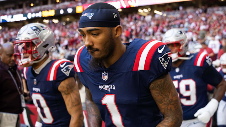 Dec 15, 2024; Glendale, Arizona, USA; New England Patriots wide receiver Ja'Lynn Polk (1) against the Arizona Cardinals at State Farm Stadium. Mandatory Credit: Mark J. Rebilas-Imagn Images