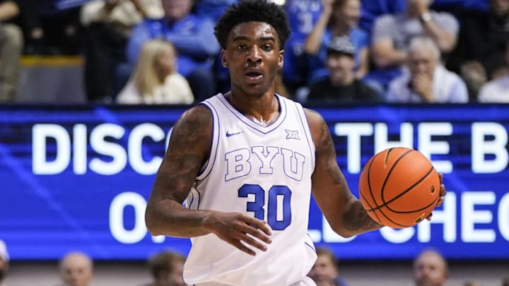 Feb 21, 2026; Provo, Utah, USA; BYU Cougars forward Kennard Davis Jr. (30) dribbles the ball during the first half against the Iowa State Cyclones at Marriott Center. Mandatory Credit: Aaron Baker-Imagn Images