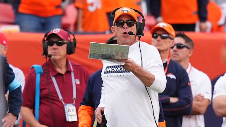Denver Broncos head coach Sean Payton calls plays during the second quarter against the Carolina Panthers at Empower Field at Mile High. 
