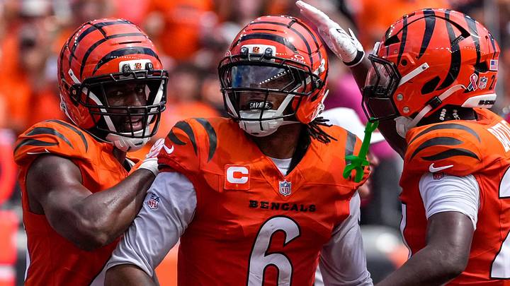 Cincinnati Bengals safety Bryan Cook celebrates with teammates against the Tampa Bay Buccaneers on Sunday, Sept. 13.