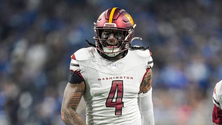 Washington Commanders linebacker Frankie Luvu (4) smiles after a play in the first half against the Detroit Lions in the NFC divisional round at Ford Field in Detroit on Saturday, Jan. 18, 2025.