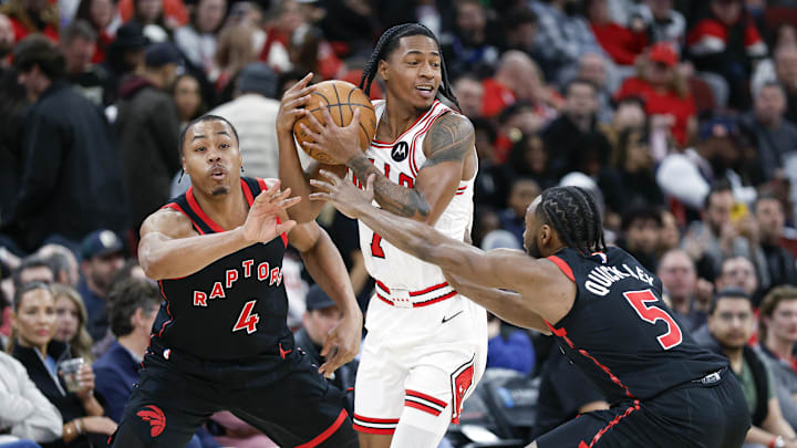 Feb 19, 2026; Chicago, Illinois, USA; Toronto Raptors forward Scottie Barnes (4) and guard Immanuel Quickley (5) defend against Chicago Bulls guard Rob Dillingham (7) during the first half at United Center. Mandatory Credit: Kamil Krzaczynski-Imagn Images Feb 19, 2026; Chicago, Illinois, USA; Toronto Raptors forward Scottie Barnes (4) and guard Immanuel Quickley (5) defend against Chicago Bulls guard Rob Dillingham (7) during the first half at United Center. Mandatory Credit: Kamil Krzaczynski-Imagn Images
