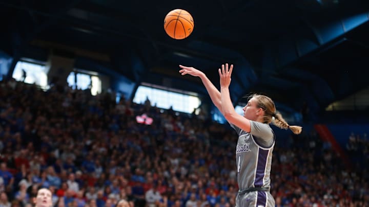 Kansas State junior guard Serena Sundell (4) shoots for two against Kansas in the second half of the Sunflower Showdown inside Allen Fieldhouse Sunday, Feb. 25, 2024.