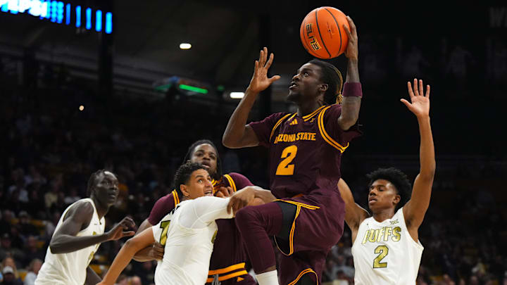Feb 7, 2026; Boulder, Colorado, USA; Arizona State Sun Devils guard Anthony Johnson (2) drives to the net in the first half against the Colorado Buffaloes at the CU Events Center. Mandatory Credit: Ron Chenoy-Imagn Images