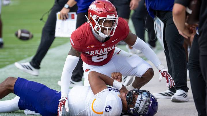 Arkansas Razorbacks nickelback Khmori House celebrates after making tackle of North Alabama quarterback Destin Wade.