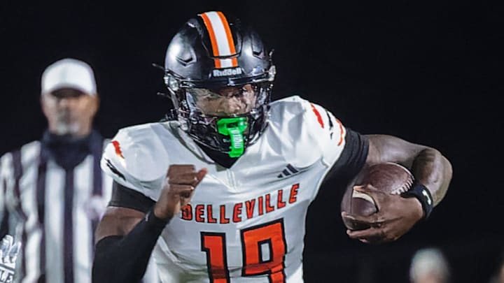 Belleville's Bryce Underwood carries the ball during a 30-29 loss to Howell Friday, Oct. 25, 2024 in Howell.