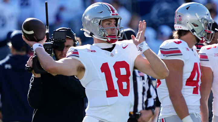 Ohio State Buckeyes quarterback Will Howard (18) warms up prior to the NCAA football game against the Penn State Nittany Lions at Beaver Stadium in University Park, Pa. on Saturday, Nov. 2, 2024.