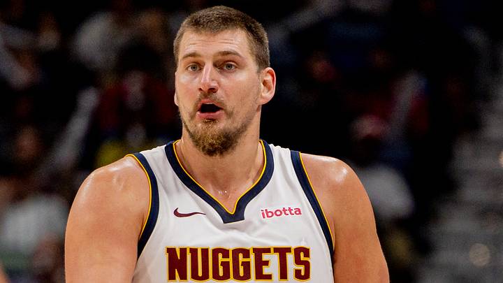 Nov 19, 2025; New Orleans, Louisiana, USA;  Denver Nuggets center Nikola Jokić (15) reacts to a play against the New Orleans Pelicans during the second half  at Smoothie King Center. Mandatory Credit: Stephen Lew-Imagn Images