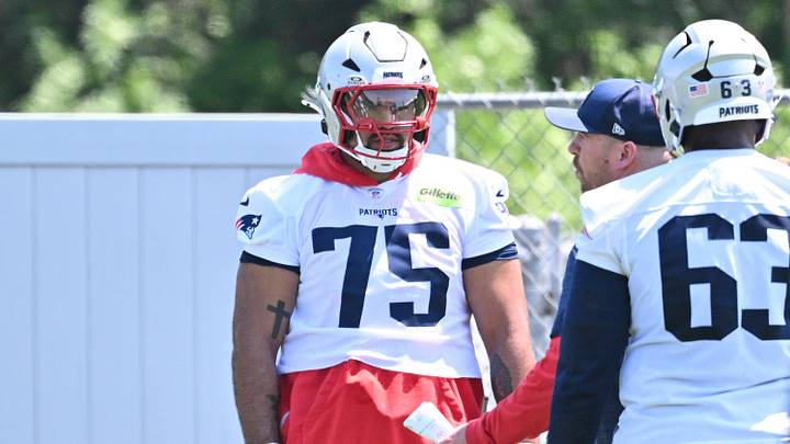 Jun 10, 2026; Foxborough, MA, USA; New England Patriots guard Alijah Vera-Tucker (75) works with coaching staff during minicamp at Gillette Stadium. Mandatory Credit: Eric Canha-Imagn Images