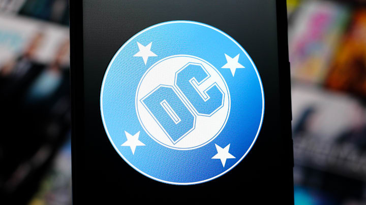 In this photo illustration, the DC Comics logo is seen.