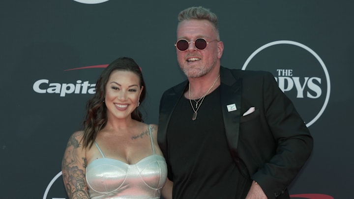 Los Angeles, CA, USA; ESPN analyst Pat McAfee arrives with his wife Samantha McAfee on the red carpet before the 2023 ESPYS at the Dolby Theatre. 
