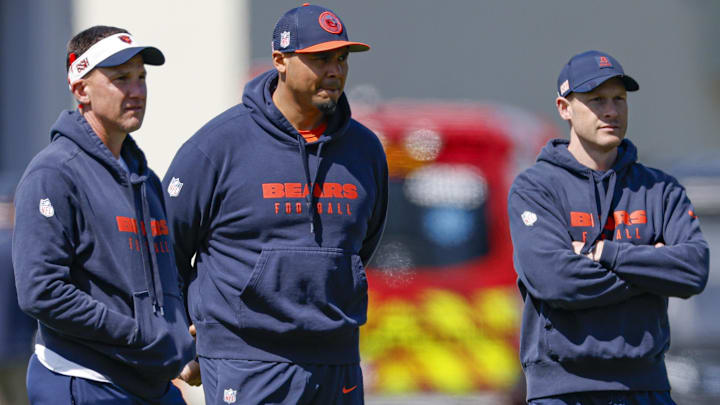 May 9, 2025; Lake Forest, IL, USA; Chicago Bears defensive coordinator Dennis Allen (L), general manager Ryan Poles (C), and head coach Ben Johnson (R) observe during the Rookie Minicamp at Halas Hall. May 9, 2025; Lake Forest, IL, USA; Chicago Bears defensive coordinator Dennis Allen (L), general manager Ryan Poles (C), and head coach Ben Johnson (R) observe during the Rookie Minicamp at Halas Hall.