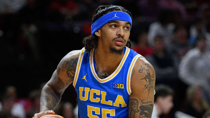 Jan 10, 2025; College Park, Maryland, USA; UCLA Bruins guard Skyy Clark (55) looks to pass the ball during the second half against the Maryland Terrapins at Xfinity Center. Mandatory Credit: Reggie Hildred-Imagn Images