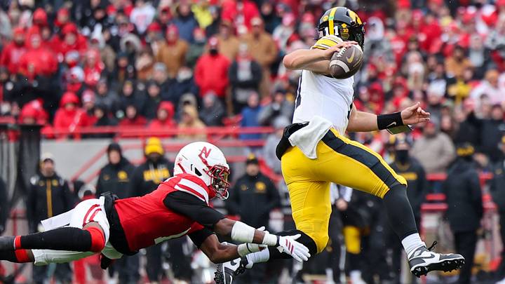 Iowa quarterback Mark Gronowski evades the rush and finds an open receiver to extend a third-quarter touchdown drive last season. Iowa quarterback Mark Gronowski evades the rush and finds an open receiver to extend a third-quarter touchdown drive last season.