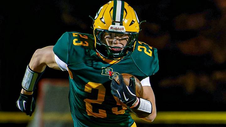Will Adams takes the ball up field for Bishop Guertin