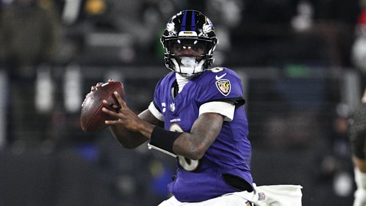 Jan 11, 2025; Baltimore, Maryland, USA; Baltimore Ravens quarterback Lamar Jackson (8) looks to pass against the Pittsburgh Steelers in the third quarter in an AFC wild card game at M&T Bank Stadium. Mandatory Credit: Tommy Gilligan-Imagn Images Jan 11, 2025; Baltimore, Maryland, USA; Baltimore Ravens quarterback Lamar Jackson (8) looks to pass against the Pittsburgh Steelers in the third quarter in an AFC wild card game at M&T Bank Stadium. Mandatory Credit: Tommy Gilligan-Imagn Images