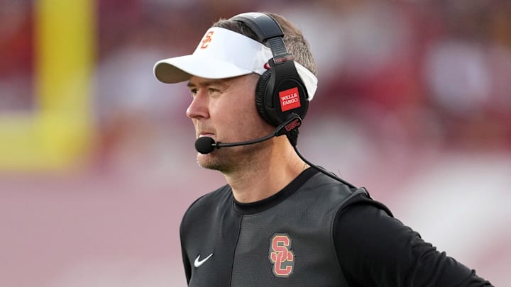 Aug 30, 2025; Los Angeles, California, USA; Southern California Trojans head coach Lincoln Riley watches from the sidelines against the Missouri State Bears in the first half at United Airlines Field at Los Angeles Memorial Coliseum. Mandatory Credit: Kirby Lee-Imagn Images
