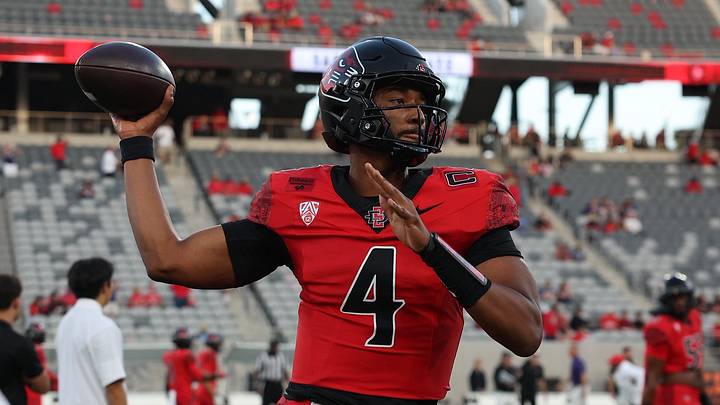 San Diego State Aztecs quarterback Jayden Denegal (4). San Diego State Aztecs quarterback Jayden Denegal (4).