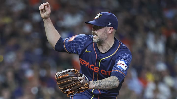 Jul 29, 2024; Houston, Texas, USA; Houston Astros relief pitcher Ryan Pressly (55) delivers a pitch during the eighth inning against the Pittsburgh Pirates at Minute Maid Park