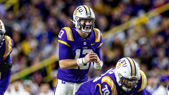 Nov 30, 2024; Baton Rouge, Louisiana, USA;  LSU Tigers quarterback Garrett Nussmeier (13) calls for the ball against the Oklahoma Sooners during the first quarter at Tiger Stadium. Mandatory Credit: Stephen Lew-Imagn Images