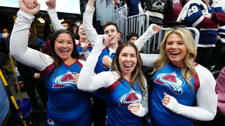 Apr 16, 2026; Denver, Colorado, USA; Members of the Colorado Avalanche ice patrol team celebrate the win over the Seattle Kraken in the second period at Ball Arena. Mandatory Credit: Ron Chenoy-Imagn Images