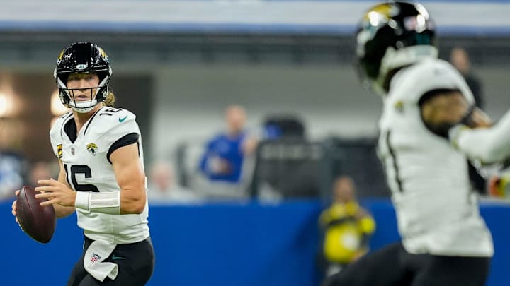 Jacksonville Jaguars quarterback Trevor Lawrence (16) looks to pass downfield Sunday, Dec. 28, 2025, during a game against the Indianapolis Colts at Lucas Oil Stadium in Indianapolis.