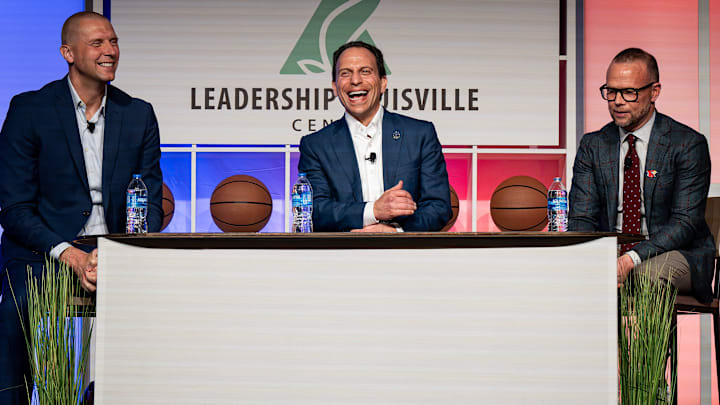Louisville Mayor Craig Greenberg, center, shared a laugh with Louisville basketball coach Pat Kelsey and Kentucky basketball coach Mark Pope at the 2024 Leadership Louisville Luncheon at the Kentucky International Convention Center in downtown Louisville on Wednesday, August 28, 2024.