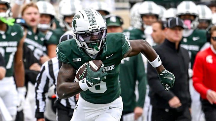 Michigan State's Nick Marsh, left, runs after a catch against UCLA during the first quarter on Saturday, Oct. 11, 2025, at Spartan Stadium in East Lansing. Michigan State's Nick Marsh, left, runs after a catch against UCLA during the first quarter on Saturday, Oct. 11, 2025, at Spartan Stadium in East Lansing.