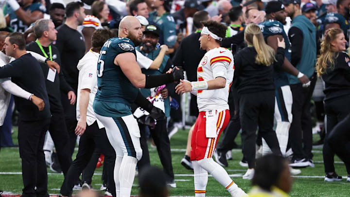 Feb 9, 2025; New Orleans, LA, USA; Philadelphia Eagles offensive tackle Lane Johnson (65) greens Kansas City Chiefs quarterback Patrick Mahomes (15) after Super Bowl LIX at Caesars Superdome. Mandatory Credit: Bill Streicher-Imagn Images