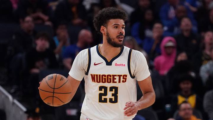 Feb 22, 2026; San Francisco, California, USA; Denver Nuggets forward Cameron Johnson (23) dribbles upcourt against the Golden State Warriors in the third quarter at Chase Center. Feb 22, 2026; San Francisco, California, USA; Denver Nuggets forward Cameron Johnson (23) dribbles upcourt against the Golden State Warriors in the third quarter at Chase Center.