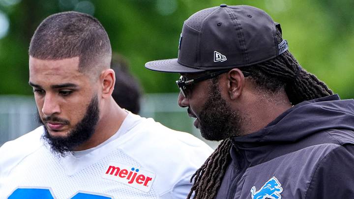 Detroit Lions defensive end Ahmed Hassanein (99), left, talks to defensive coordinator Kelvin Sheppard after practice Detroit Lions defensive end Ahmed Hassanein (99), left, talks to defensive coordinator Kelvin Sheppard after practice