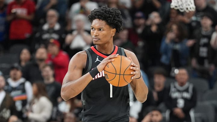 Mar 8, 2026; San Antonio, Texas, USA;  Houston Rockets guard Amen Thompson (1) holds the ball before the game against the San Antonio Spurs at Frost Bank Center. Mandatory Credit: Daniel Dunn-Imagn Images