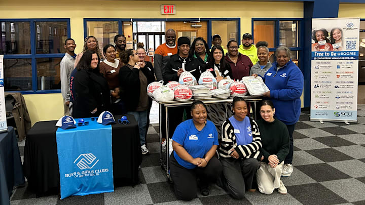 New England Patriots wide receiver DeMario Douglas visits the Boys and Girls Clubs of Metro South in Brockton, Massachusetts, as part of a turkey drive across the state.