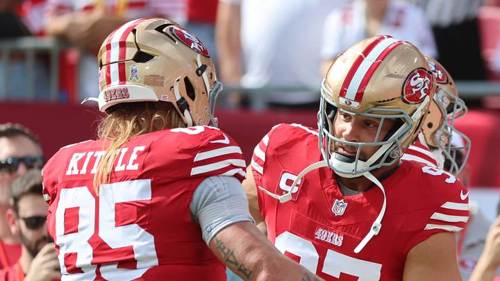 San Francisco 49ers tight end George Kittle (85) and defensive end Nick Bosa (97)